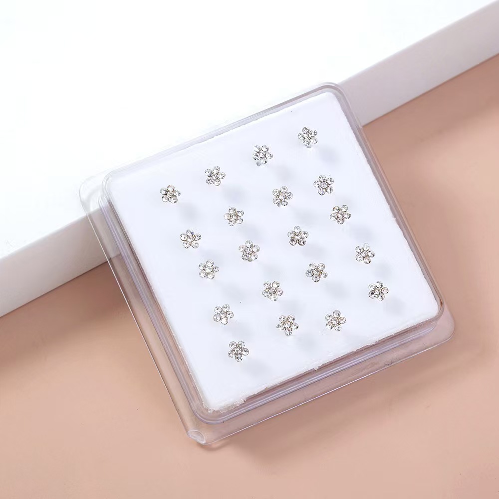 Body Jewelry Display Case - 20 ピース/箱ボディ鼻ピアスジュエリー鼻リングシルバー針女性のためのカラークリスタルフラワー鼻ジュエリー卸売